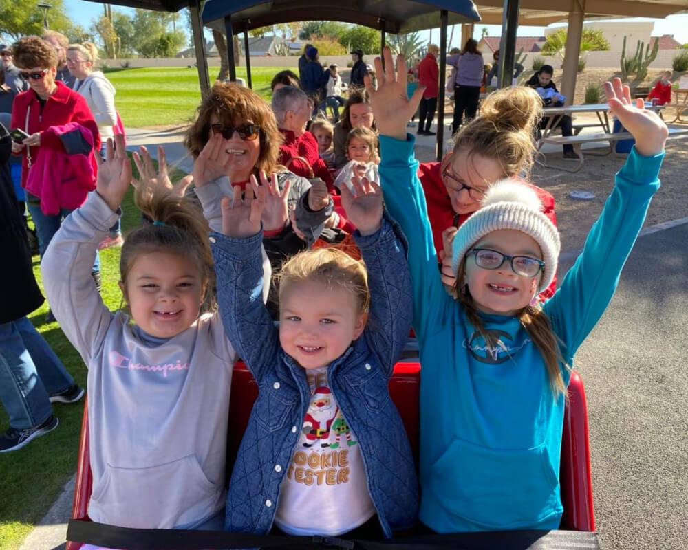 Girls on trackless train.